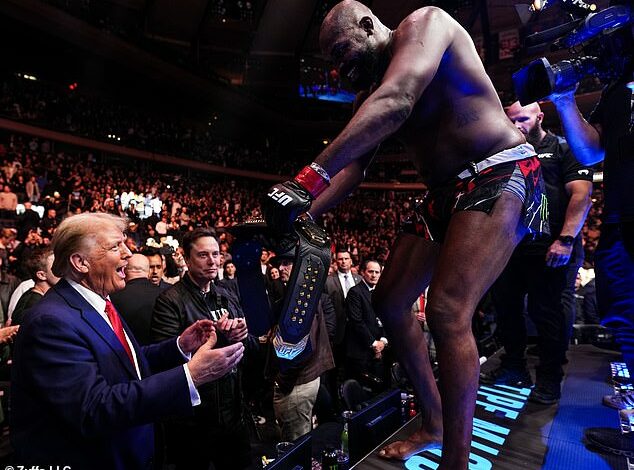 Iconic moment as UFC hardman Jon Jones hands Donald Trump his championship belt and bows to the president-elect – sending fans wild