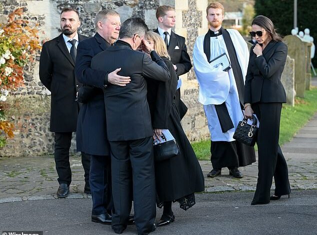 Liam Payne’s parents’ moment of comfort for heartbroken Simon Cowell: Music mogul is hugged by the singer’s mother and father after the One Direction star’s private funeral