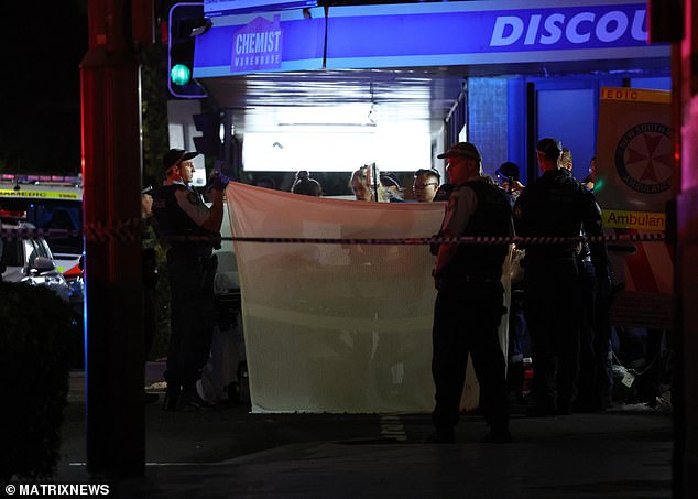 Man is shot dead on busy Sydney street as a massive police operation is launched