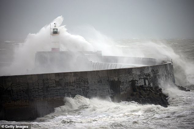 Flash floods in Britain: The moment raging floodwaters envelop a town in seconds as Storm Bert causes travel chaos and death toll rises to five