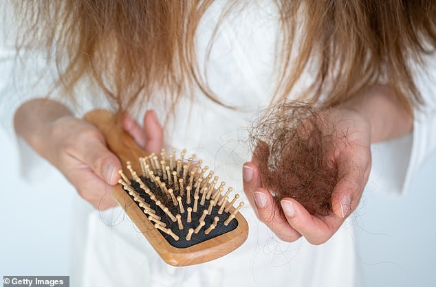 Hair falling out in the shower? Experts warn this could be due to common infections that are on the rise