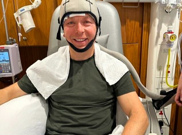 Pictured: Sir Chris Hoy undergoes life-saving chemotherapy for deadly prostate cancer while wearing a handy device