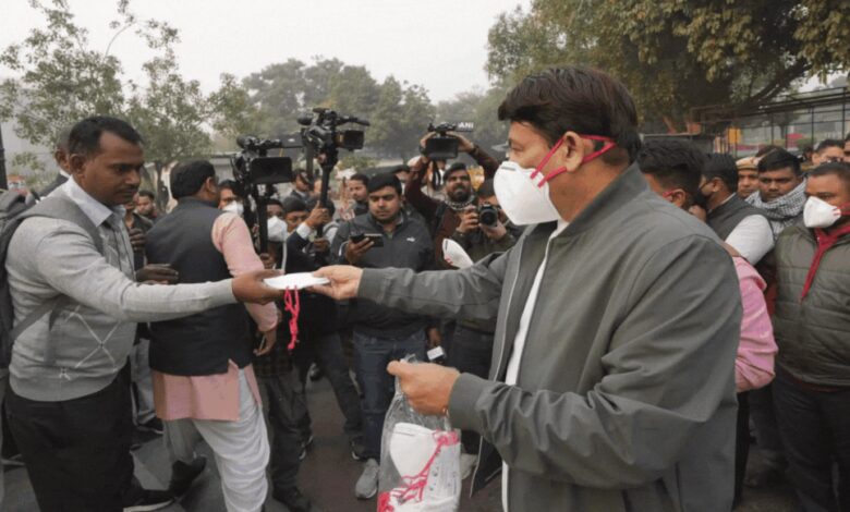 ‘This is like imposing a state of emergency’: BJP MP Manoj Tiwari distributes masks in Delhi as AQI reaches ‘severe plus’ | India News – Times of India