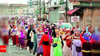 Unrest in Manipur: Hundreds defy Imphal curfew, hold anti-Afspa protest | India News – Times of India