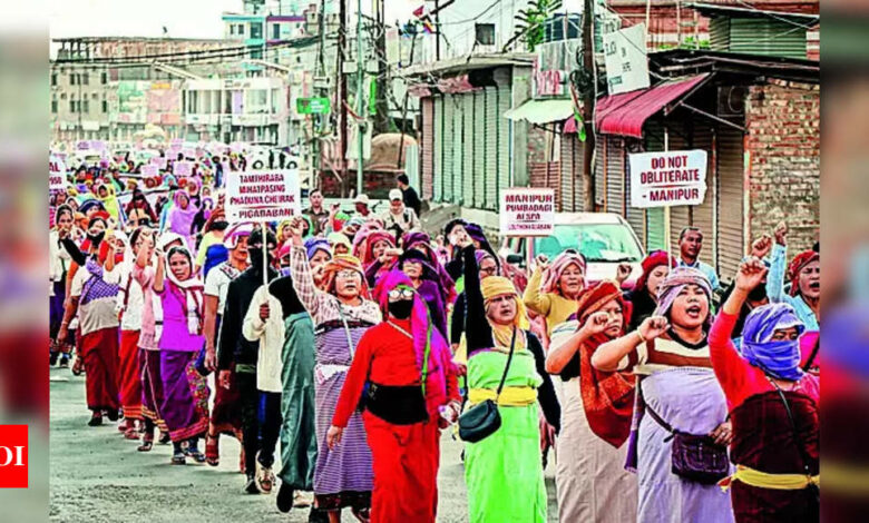 Unrest in Manipur: Hundreds defy Imphal curfew, hold anti-Afspa protest | India News – Times of India