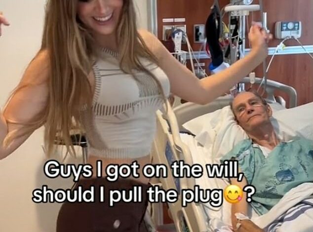 Model mocked for happily dancing next to her elderly boyfriend’s hospital bed as she prepares to inherit his fortune